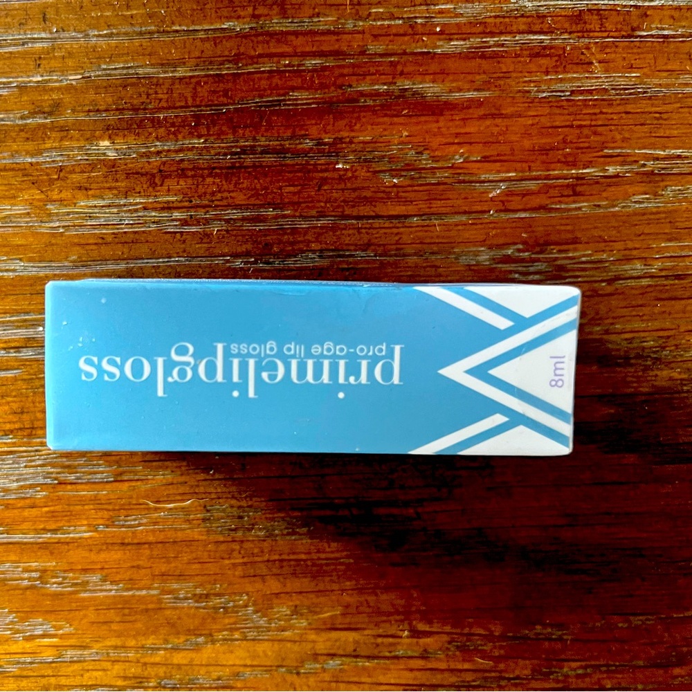 Pro-Age Lip Gloss - not sure what color as package has not been opened